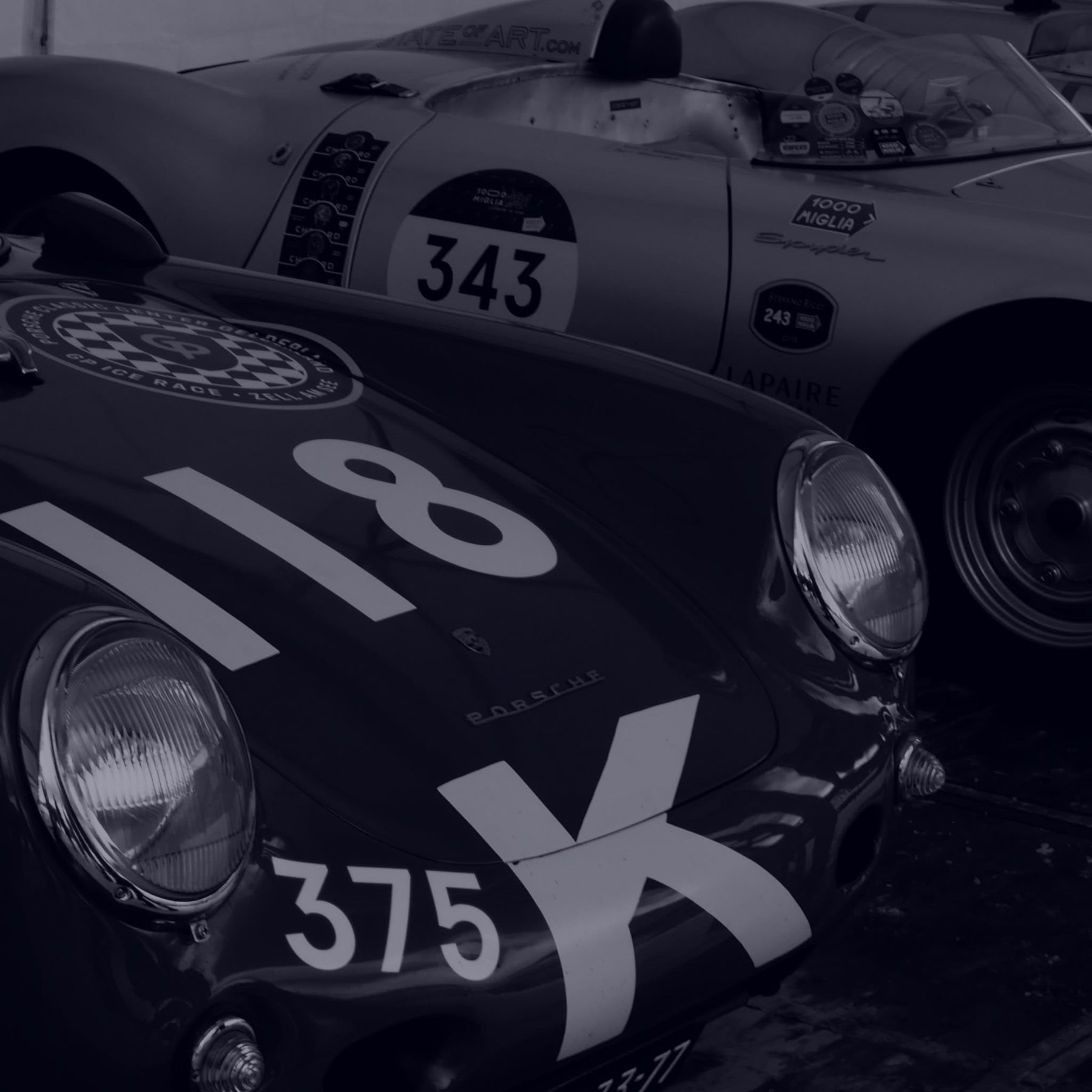 Classic Porsche race cars in private car storage near Stuttgart